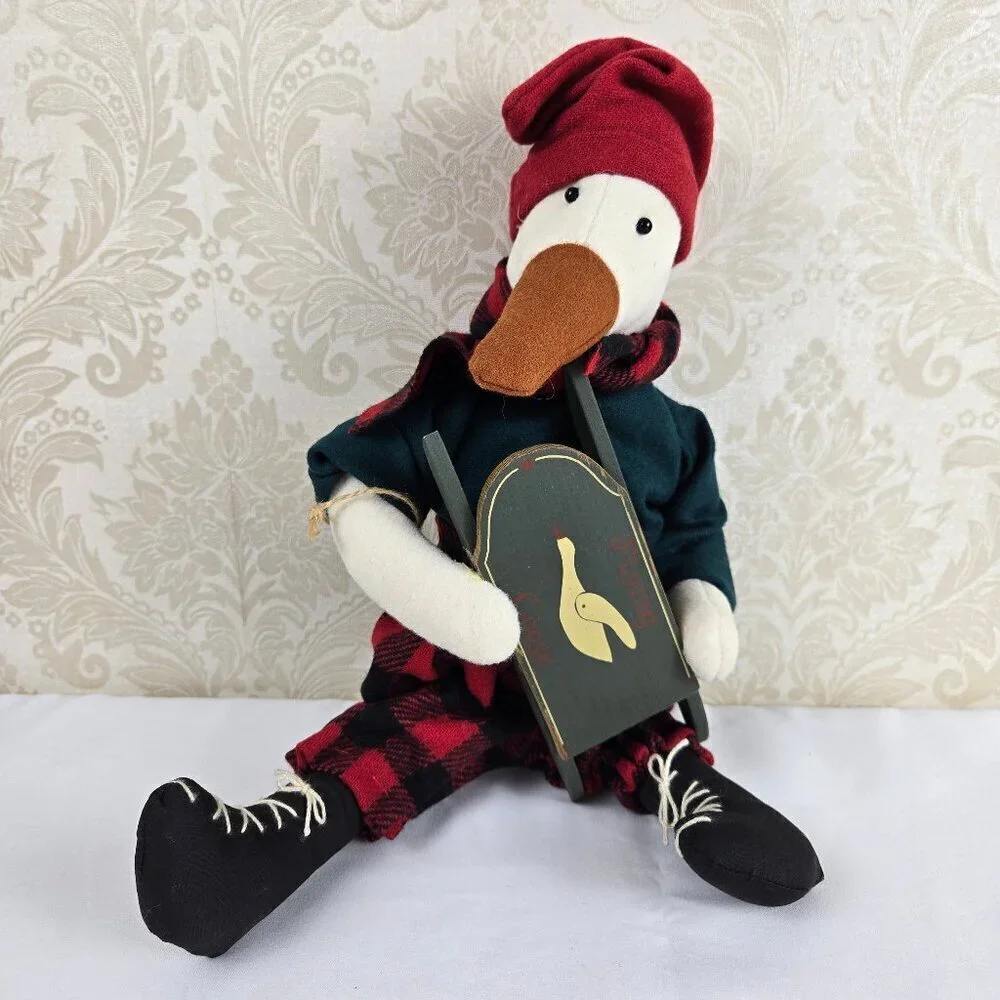 Stuffed Goose in Winter Attire Holding 